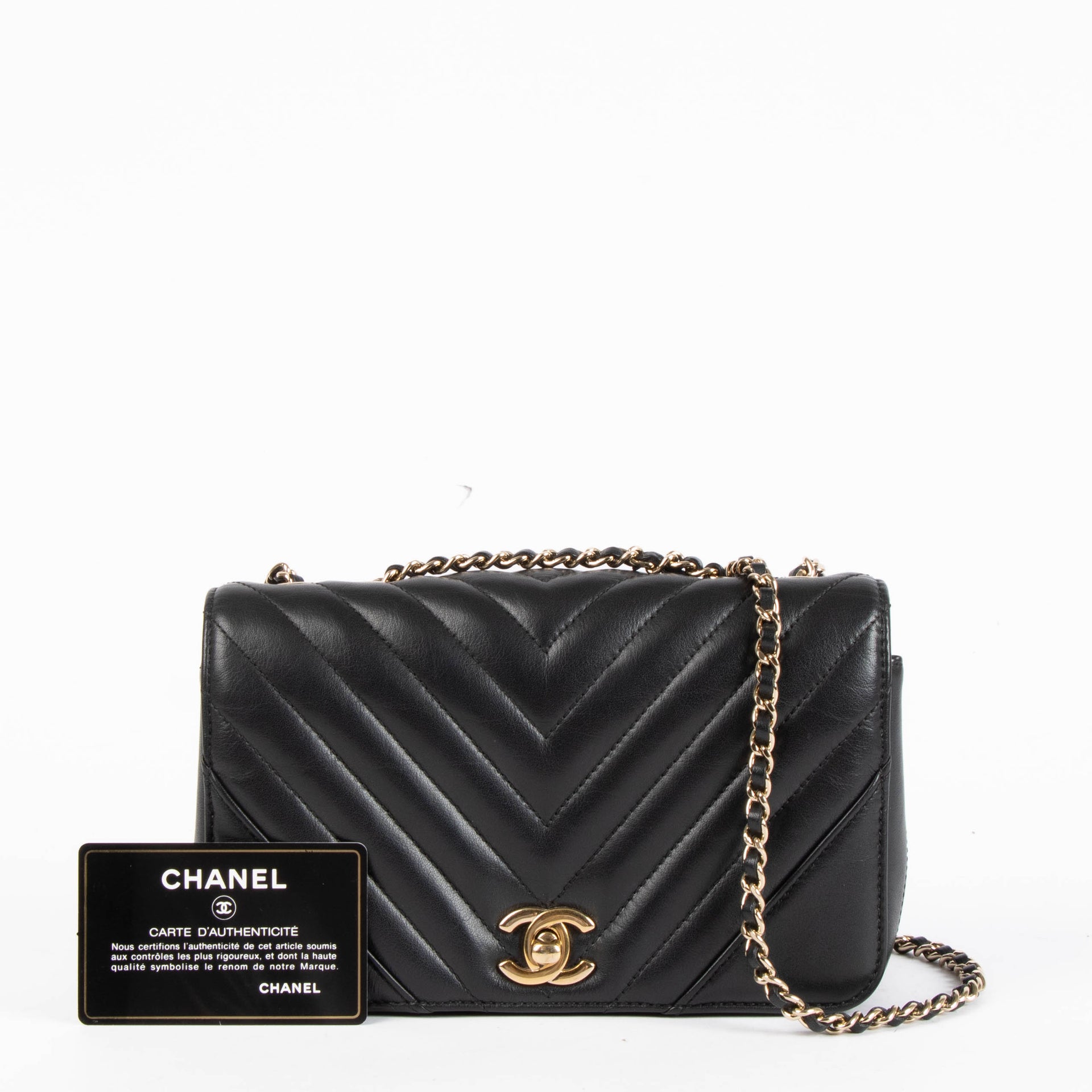 Shop this 100% authentic Chanel Black Chevron Mini Flap Bag at Labellov.com