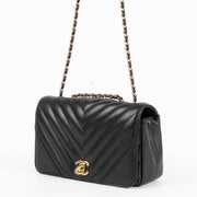 Shop this 100% authentic Chanel Black Chevron Mini Flap Bag at Labellov.com
