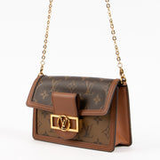 Shop the authentic Louis Vuitton Monogram Dauphine Chain Wallet on Labellov.com !