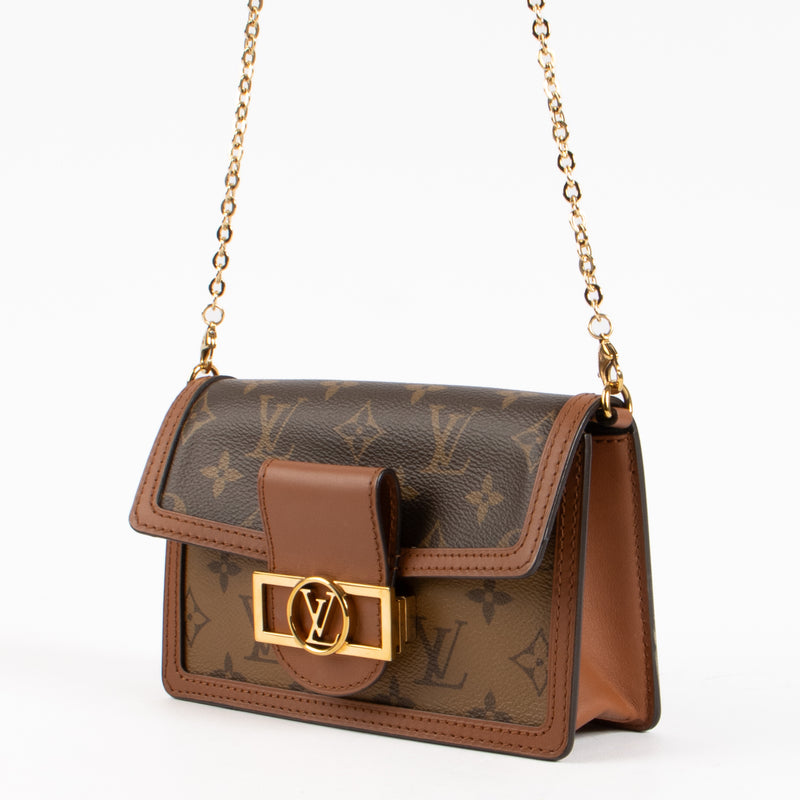 Shop the authentic Louis Vuitton Monogram Dauphine Chain Wallet on Labellov.com !