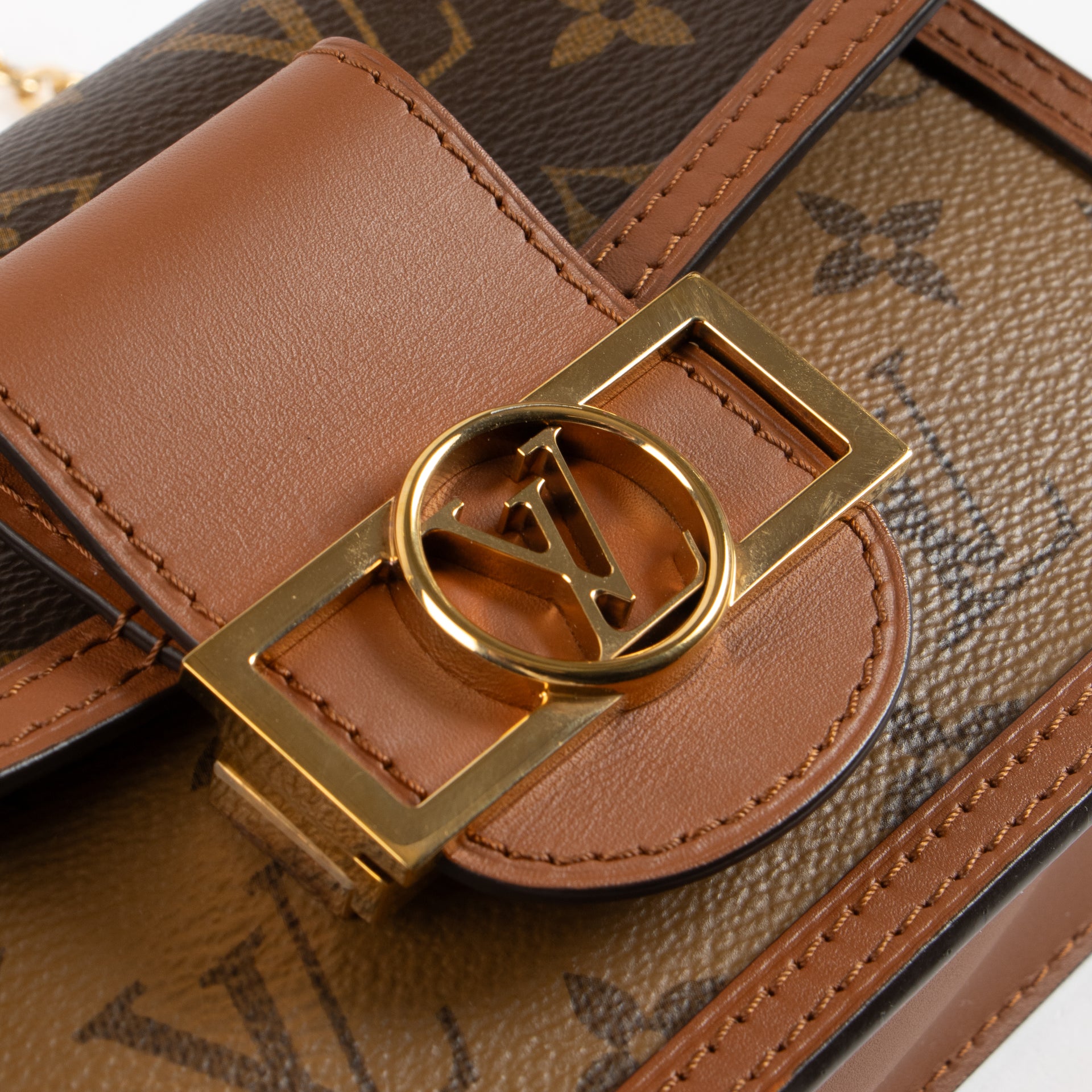 Shop the authentic Louis Vuitton Monogram Dauphine Chain Wallet on Labellov.com !