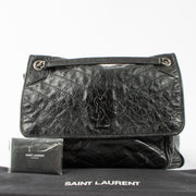 Shop this authentic Saint Laurent Black Large Niki Bag pre-loved on Labellov.com