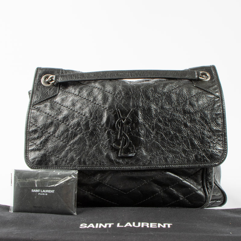 Shop this authentic Saint Laurent Black Large Niki Bag pre-loved on Labellov.com