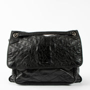 Shop this authentic Saint Laurent Black Large Niki Bag pre-loved on Labellov.com