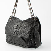 Shop this authentic Saint Laurent Black Large Niki Bag pre-loved on Labellov.com