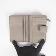 Shop the authentic Prada Taupe Saffiano Wallet second hand on Labellov.com