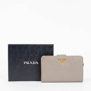 Shop the authentic Prada Taupe Saffiano Wallet second hand on Labellov.com