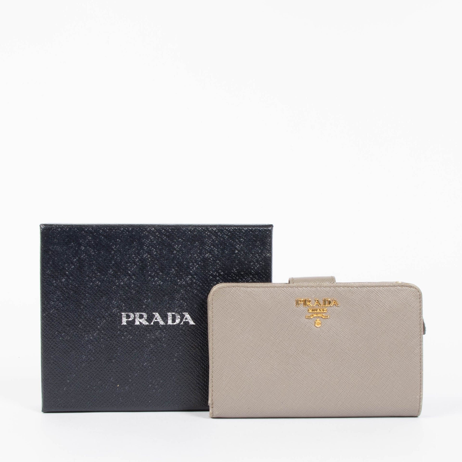 Shop the authentic Prada Taupe Saffiano Wallet second hand on Labellov.com