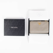 Shop the authentic Prada Taupe Saffiano Wallet second hand on Labellov.com
