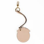 Shop the authentic Delvaux Nude Masque Magritte Charm second hand on Labellov.com
