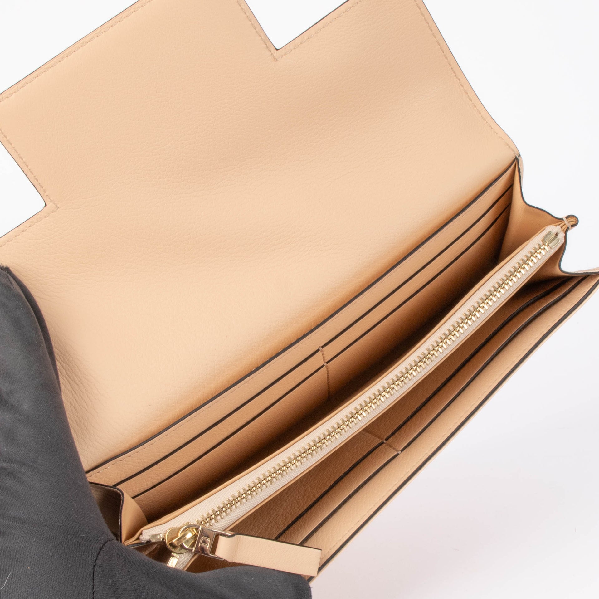 Shop this authentic Delvaux Nude Madame Wallet pre-loved on Labellov.com