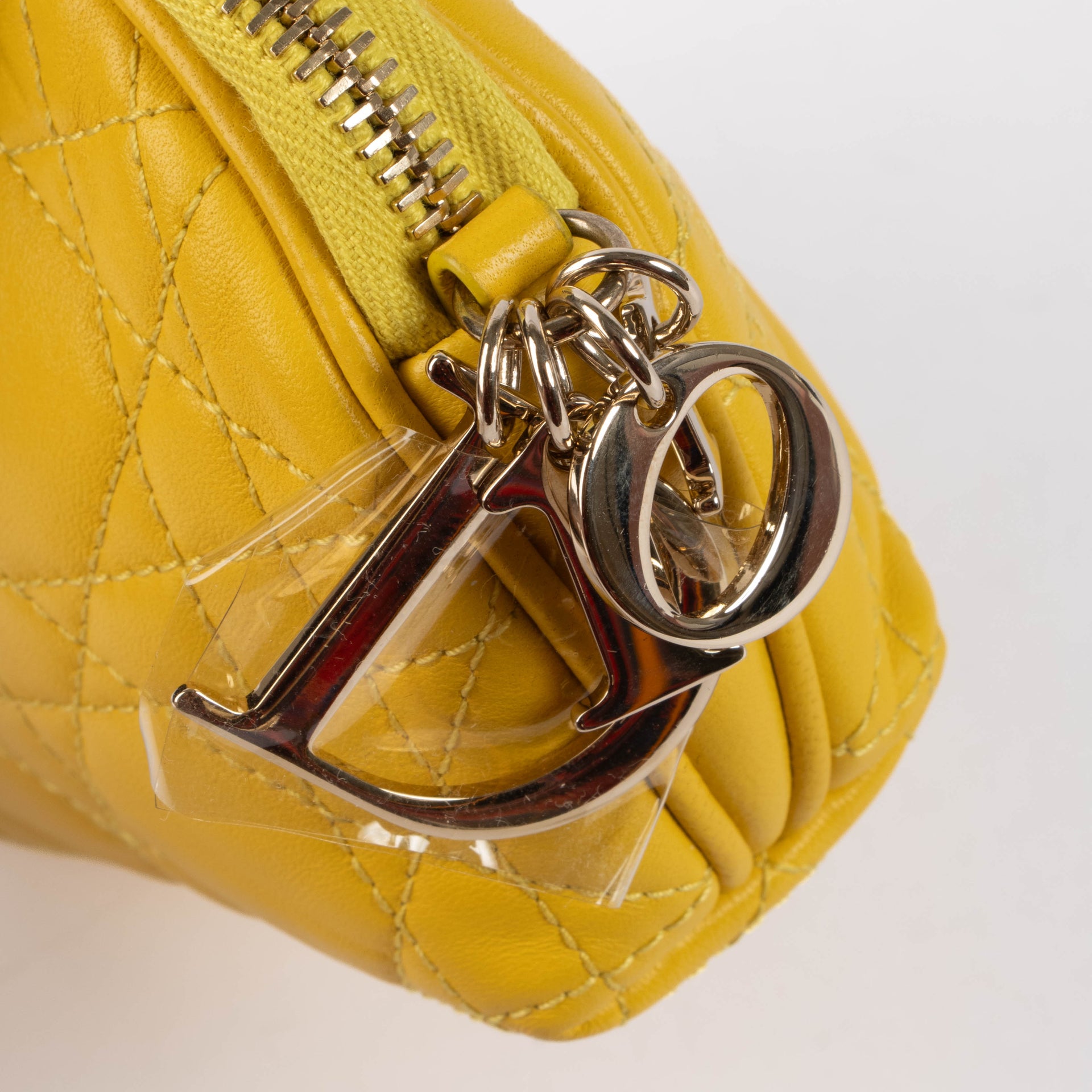 Shop the authentic Christian Dior Yellow Cannage Pouch second hand on Labellov.com