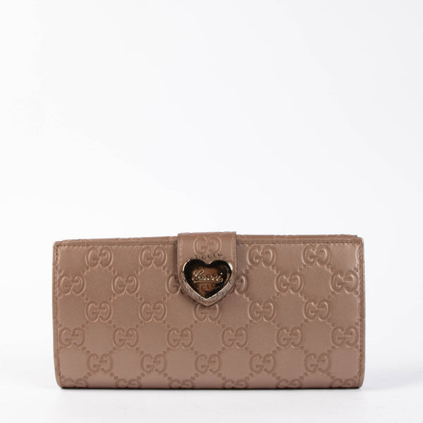 Shop the authentic Gucci Rose Gold Guccissima Wallet brand new on Labellov.com