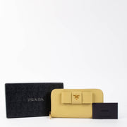 Shop the authentic Prada Polline Yellow Saffiano Wallet brand new on Labellov.com