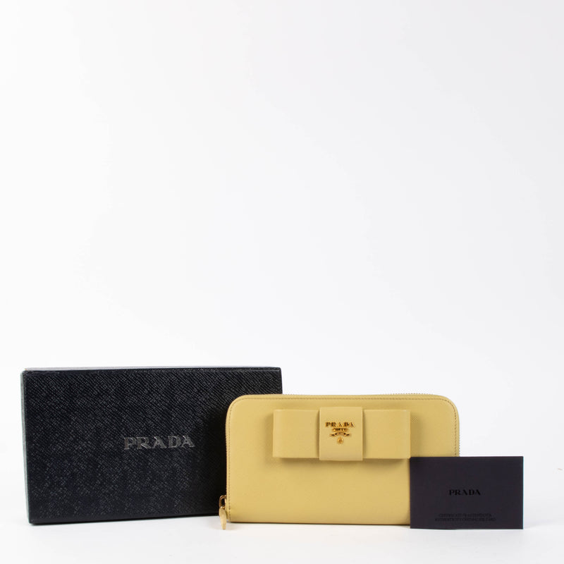 Shop the authentic Prada Polline Yellow Saffiano Wallet brand new on Labellov.com