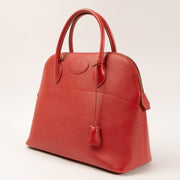 Shop this authentic Hermes Bolide 32 Rouge Vif Courcheval GHW pre-loved on Labellov.com