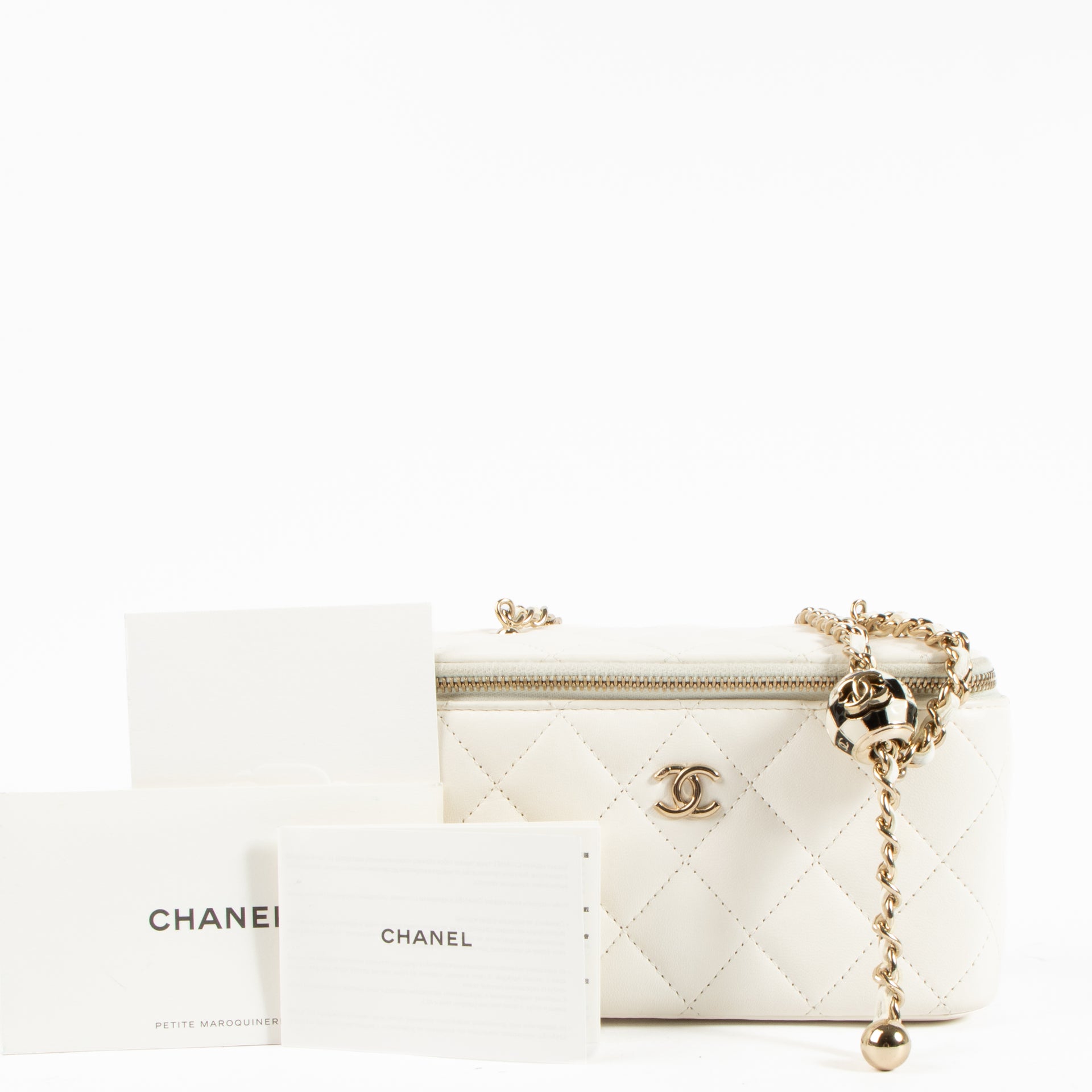 Shop the authentic Chanel White Pearl Crush Vanity Chain Shoulder Bag on Labellov.com !