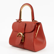 Shop the authentic Delvaux Scarlet Red Metal Glam Brillant Mini Bag on Labellov.com !