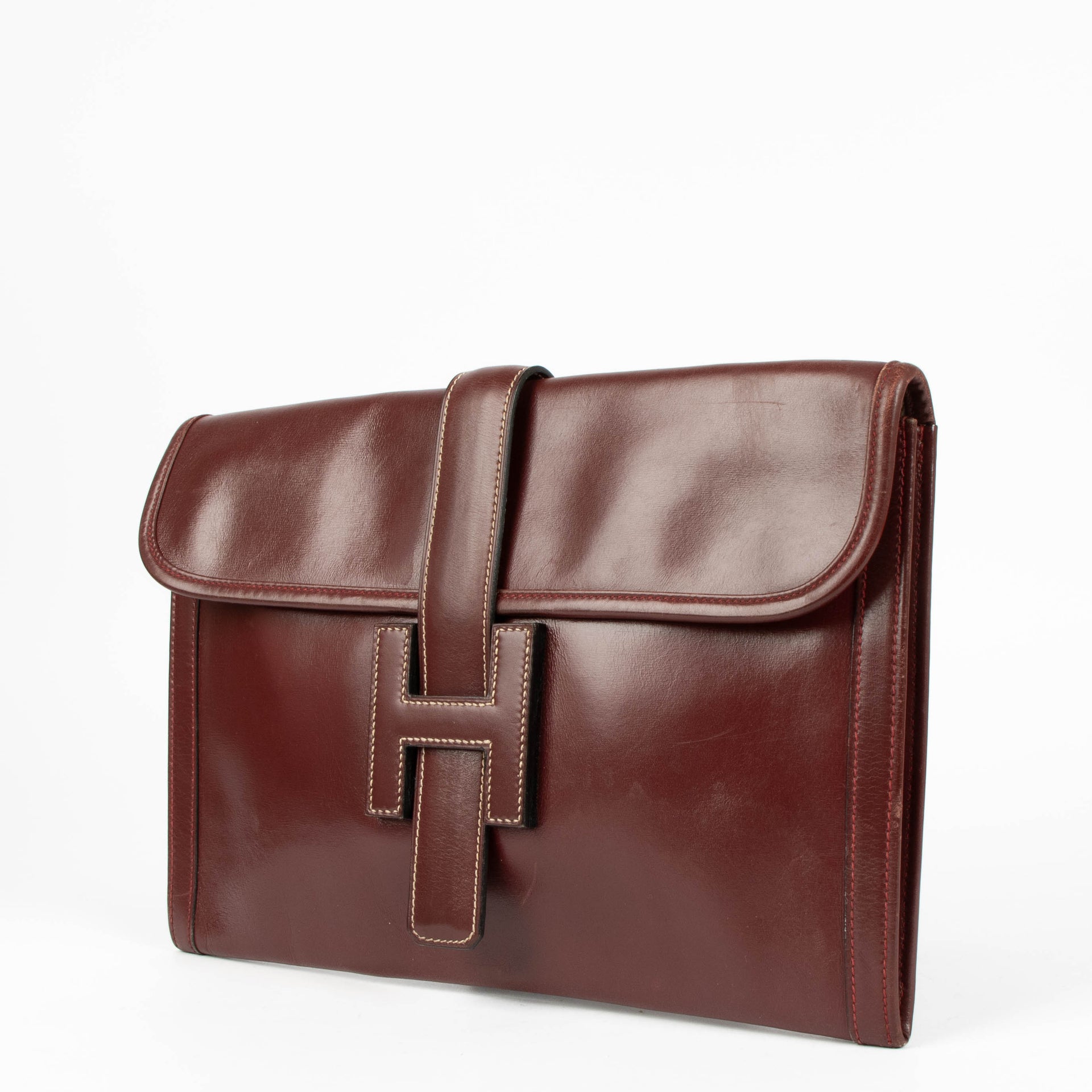 Pochette Hermès Jige PM en cuir Box Bordeaux