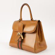 Shop this authentic Delvaux 1970s Camel Box Calf Striped Brillant MM Pre-loved on Labellov.com