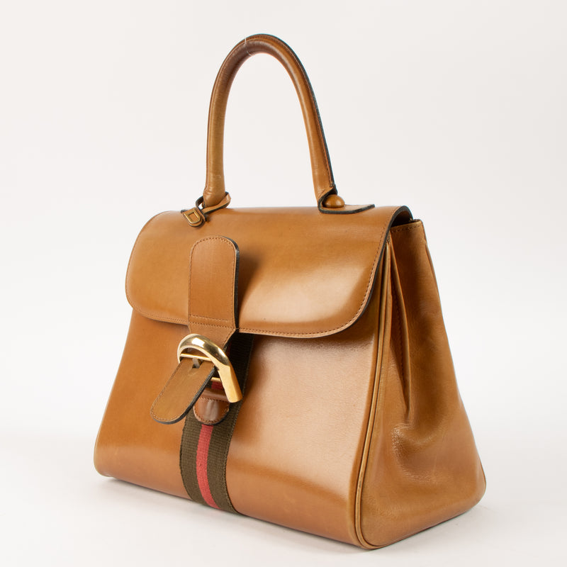 Shop this authentic Delvaux 1970s Camel Box Calf Striped Brillant MM Pre-loved on Labellov.com