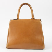 Shop this authentic Delvaux 1970s Camel Box Calf Striped Brillant MM Pre-loved on Labellov.com