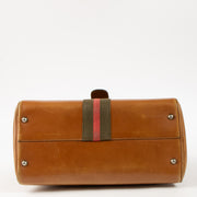 Shop this authentic Delvaux 1970s Camel Box Calf Striped Brillant MM Pre-loved on Labellov.com
