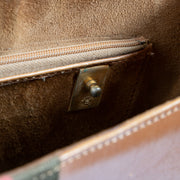 Shop this authentic Delvaux 1970s Camel Box Calf Striped Brillant MM Pre-loved on Labellov.com