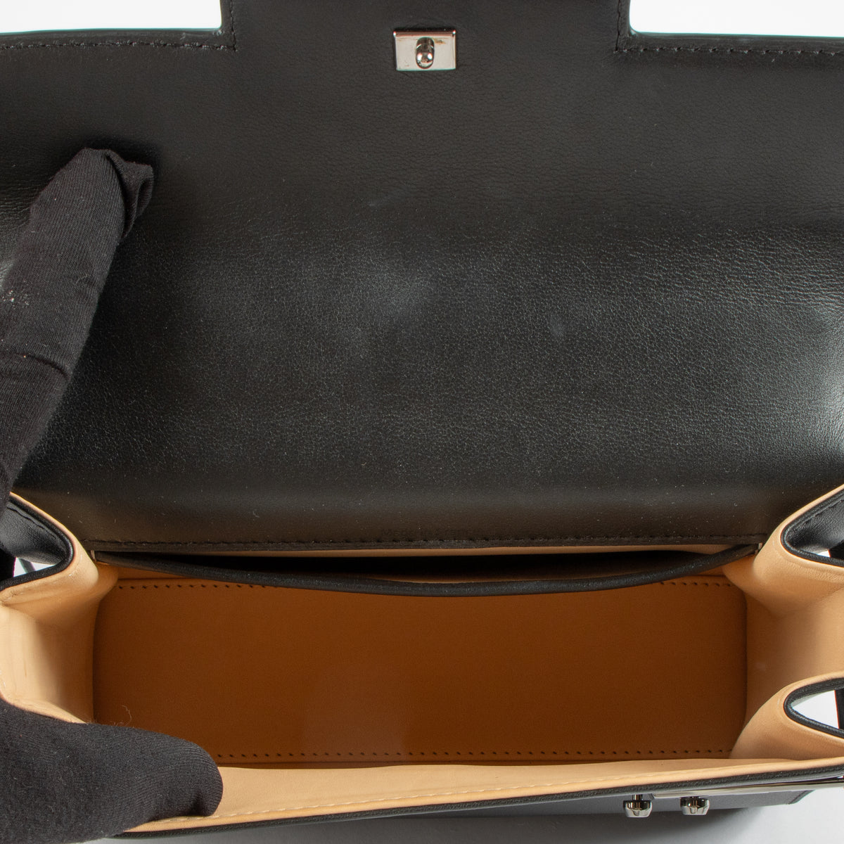 Shop the 100% authentic Delvaux All Black Calf Souple Tempête Mini Bag second hand on Labellov.com!
