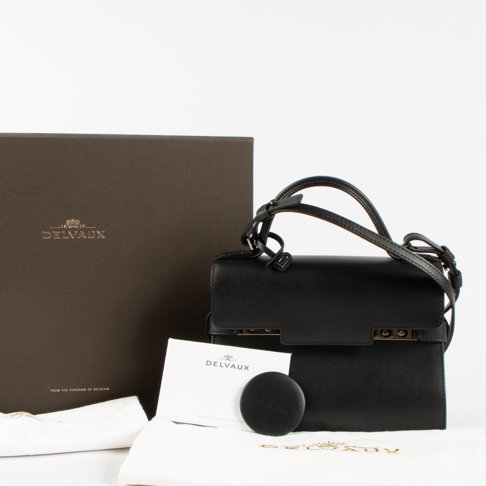 Shop the 100% authentic Delvaux All Black Calf Souple Tempête Mini Bag second hand on Labellov.com!