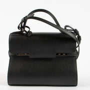 Shop the 100% authentic Delvaux All Black Calf Souple Tempête Mini Bag second hand on Labellov.com!
