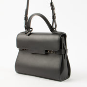 Shop the 100% authentic Delvaux All Black Calf Souple Tempête Mini Bag second hand on Labellov.com!