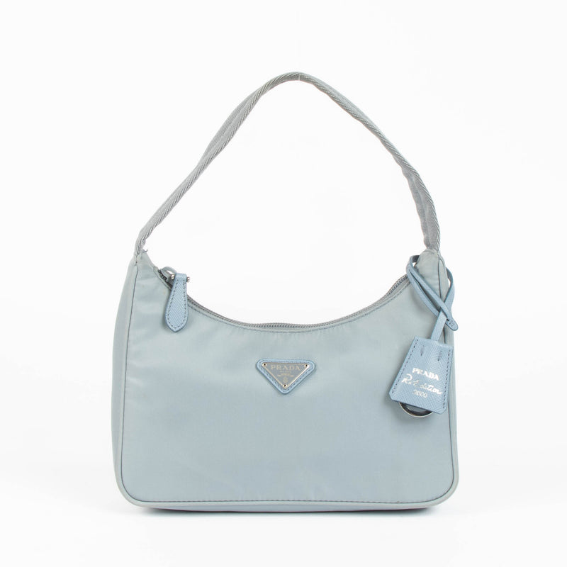 Shop this authentic Prada Blue Shoulder Re-Edition bag pre-loved on Labellov.com 