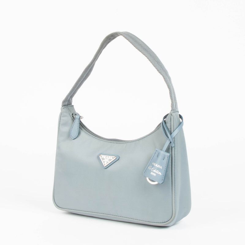 Shop this authentic Prada Blue Shoulder Re-Edition bag pre-loved on Labellov.com 