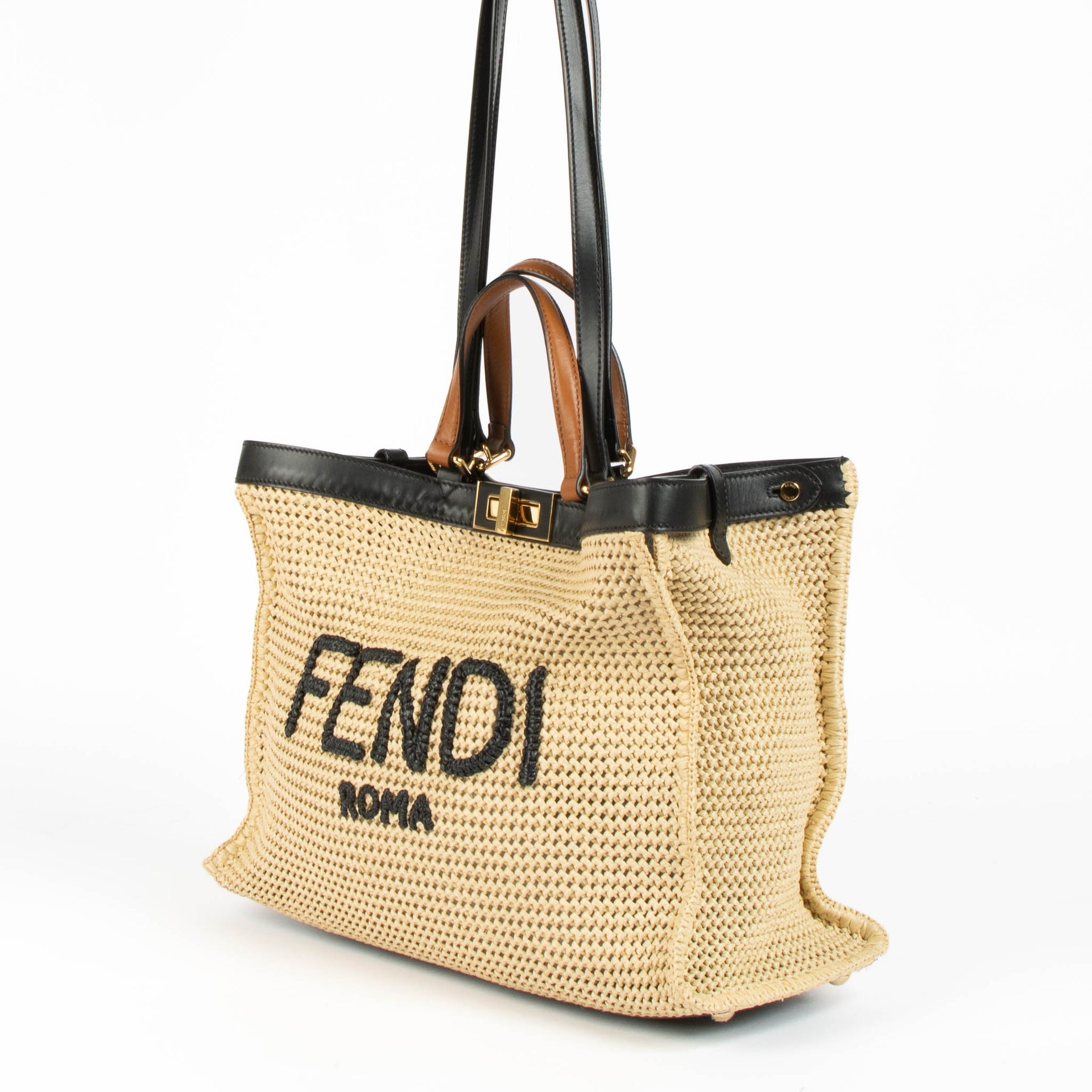Shop this authentic Fendi Beige Raffia X-Lite Medium Bag pre-loved on Labellov.com 