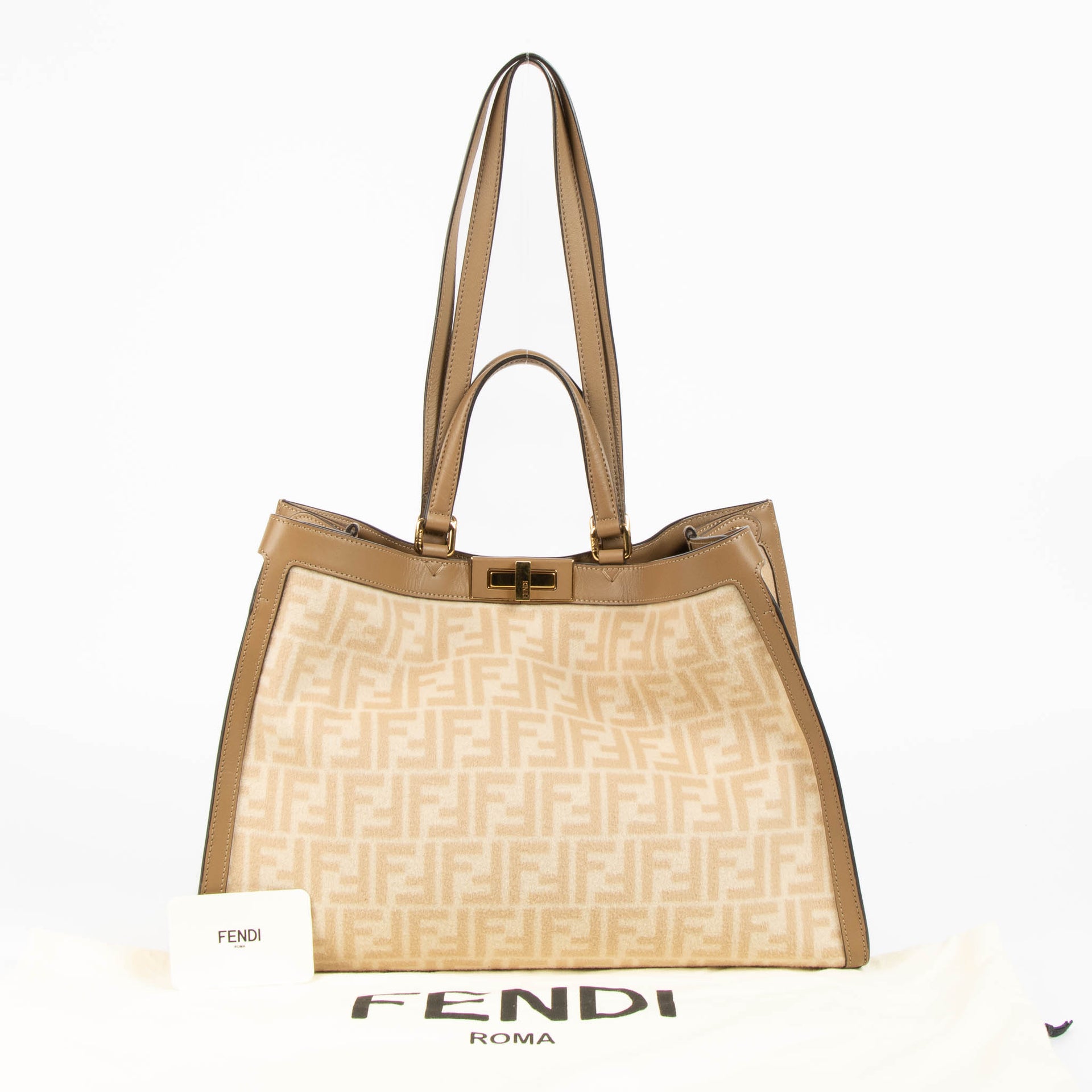 Shop this authentic Fendi Wool Beige FF 1974 x Tote Bag pre-loved on Labellov.com