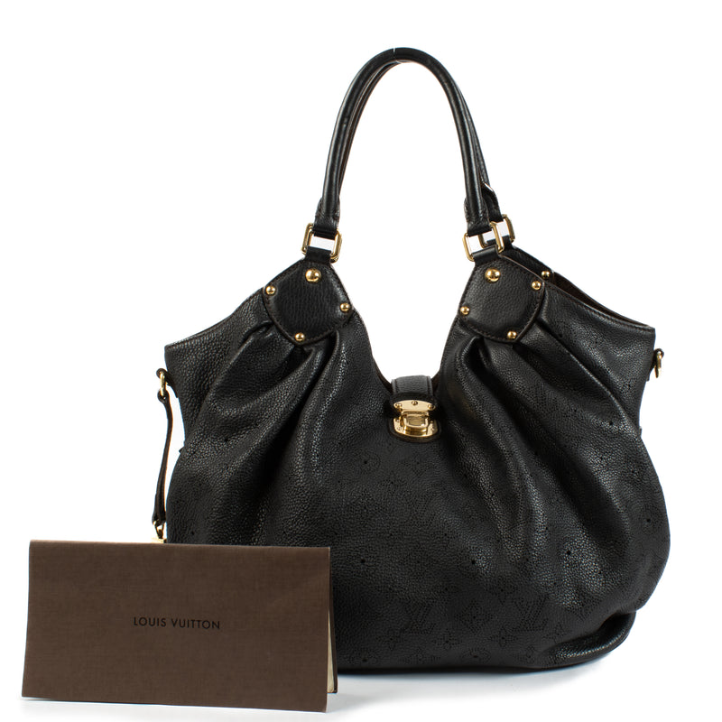 Shop the authentic Louis Vuitton Black Mahina Noel Shoulder Bag second hand on Labellov.com