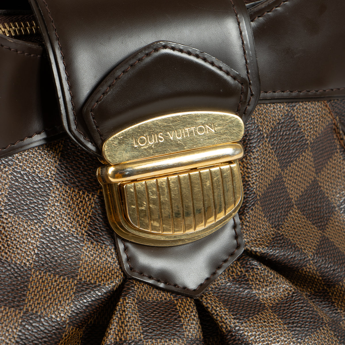 Shop this authentic Louis Vuitton Damier Ebene Sistina PM Bag pre-loved on Labellov.com