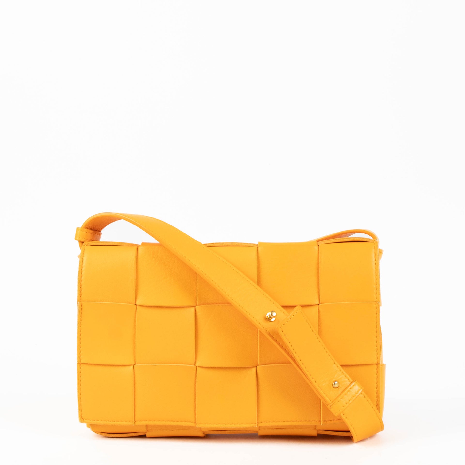 Shop the authentic Bottega Veneta Tangerine Cassette Crossbody Bag second hand on Labellov.com