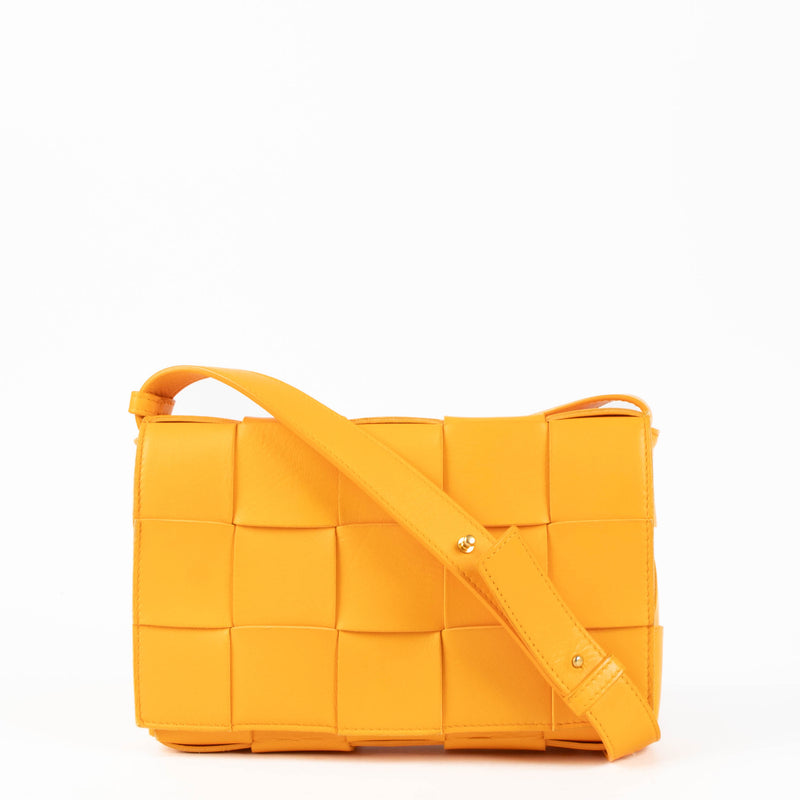 Shop the authentic Bottega Veneta Tangerine Cassette Crossbody Bag second hand on Labellov.com