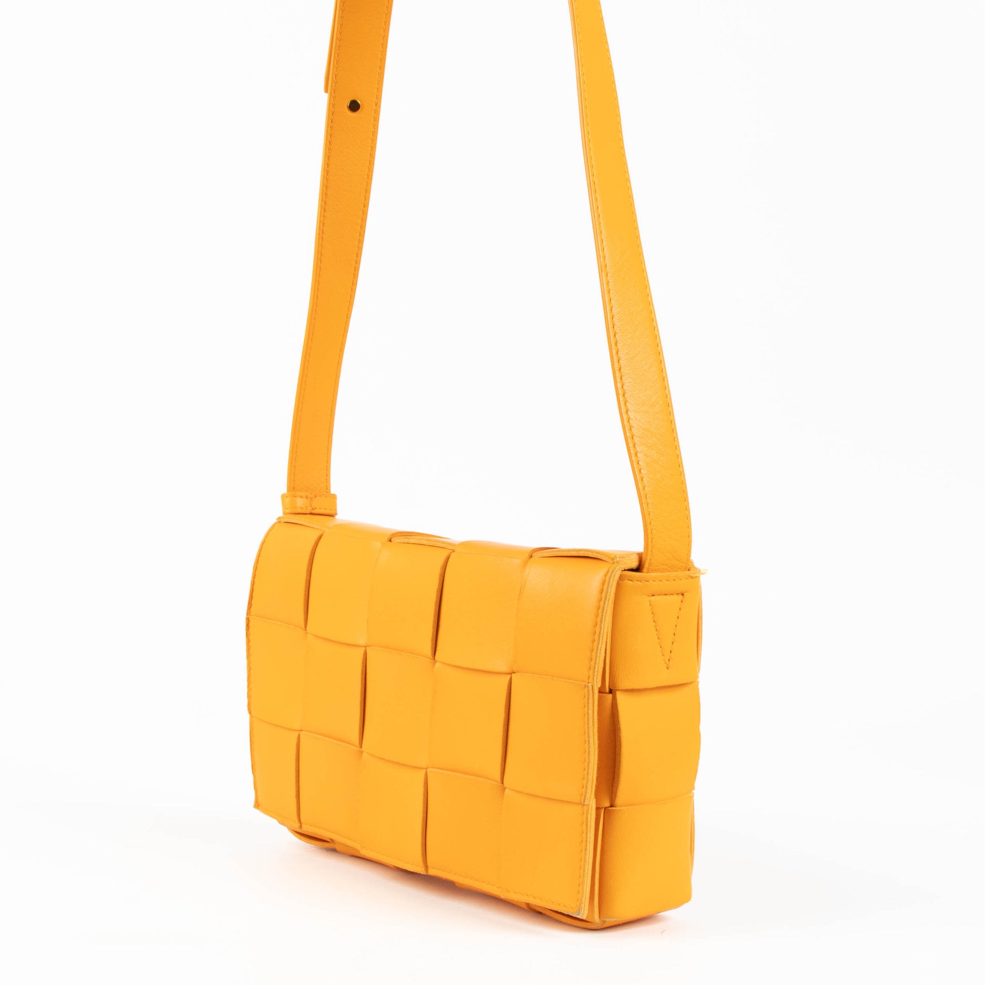 Shop the authentic Bottega Veneta Tangerine Cassette Crossbody Bag second hand on Labellov.com