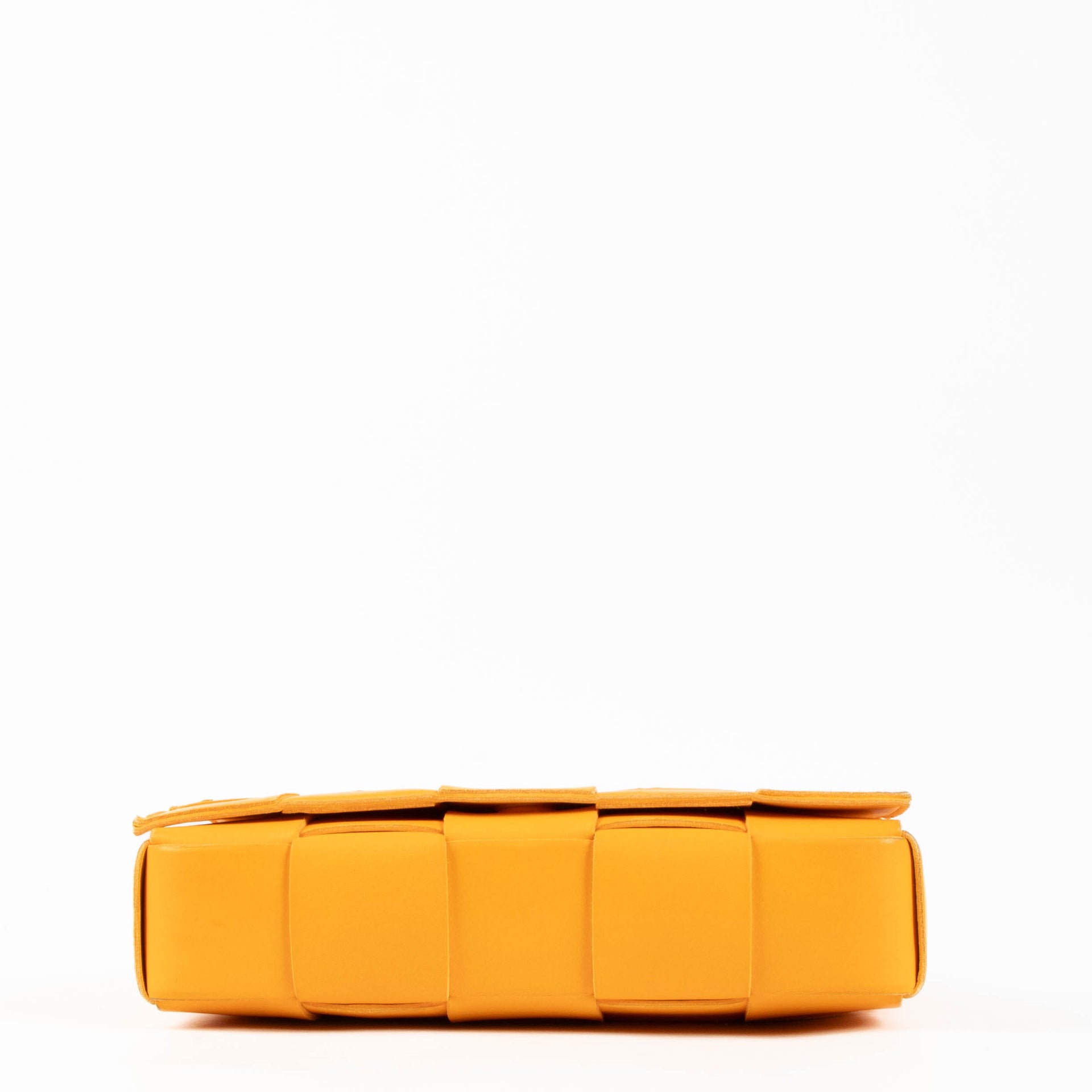 Shop the authentic Bottega Veneta Tangerine Cassette Crossbody Bag second hand on Labellov.com
