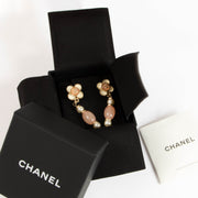Shop the authentic Chanel 16C Flower Resin Drop Earrings second hand on Labellov.com