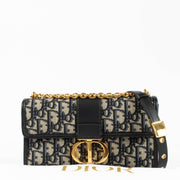 Shop the authentic Christian Dior Blue Oblique 30 Montaigne East West Bag second hand on Labellov.com
