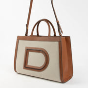Shop the Delvaux Canvas Frame Tote PM second hand on Labellov.com