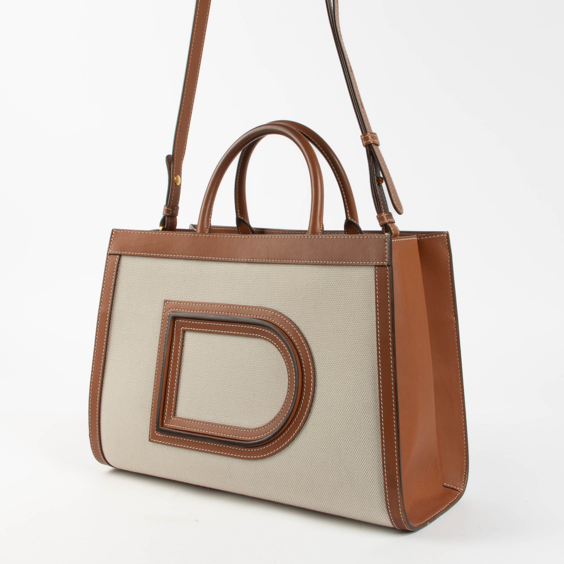 Shop the Delvaux Canvas Frame Tote PM second hand on Labellov.com