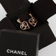 Shop the 100% authentic Chanel 22P Gold Tone CC Heart Drop Earrings second hand on Labellov.com!