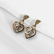 Shop the 100% authentic Chanel 22P Gold Tone CC Heart Drop Earrings second hand on Labellov.com!