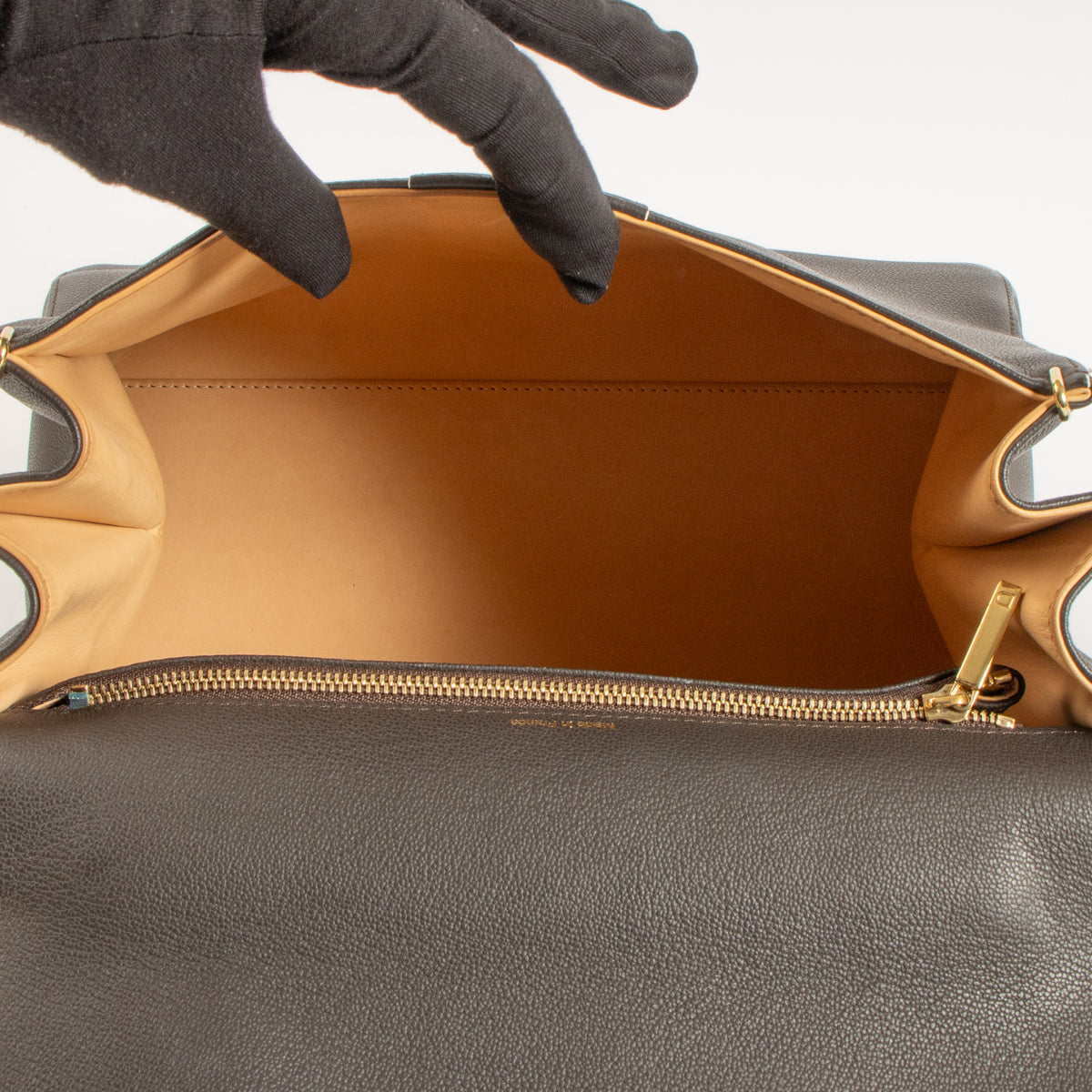 Shop this authentic Delvaux Ebene Rodeo Calf Brillant MM Bag pre-loved on Labellov.com