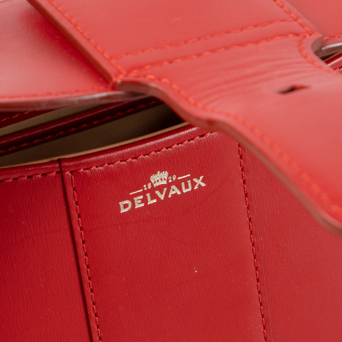 Shop this authentic Delvaux Lipstick Box Calf Brillant Mini Bag pre-loved on Labellov.com